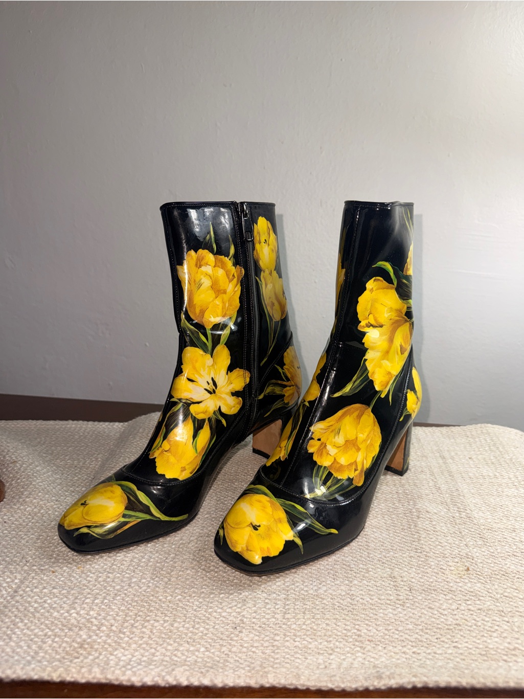 Dolce & Gabbana Black Patent Ankle Boots With Yellow Floral Motif
